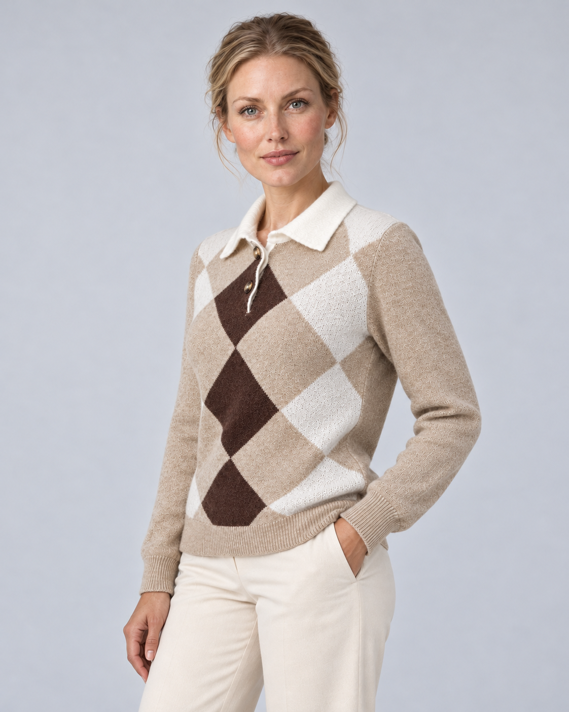 Beige argyle collared knit sweater with two-button neck and long sleeves, angled view