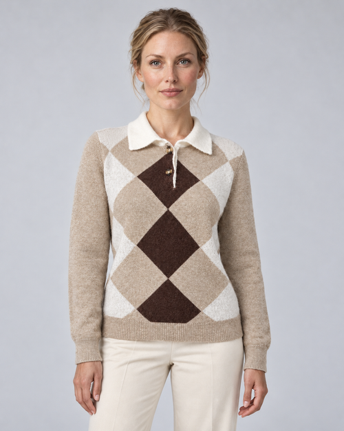 Woman wearing beige argyle knit sweater with white collar and button neck, front view