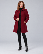 Wine tailored longline wool-blend coat with five tonal buttons and rounded patch pockets, front variation in studio