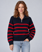 Woman wearing red striped half-zip funnel-neck jumper with long raglan sleeves, front view