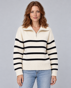 Woman wearing white striped half-zip funnel-neck jumper with long raglan sleeves, front view
