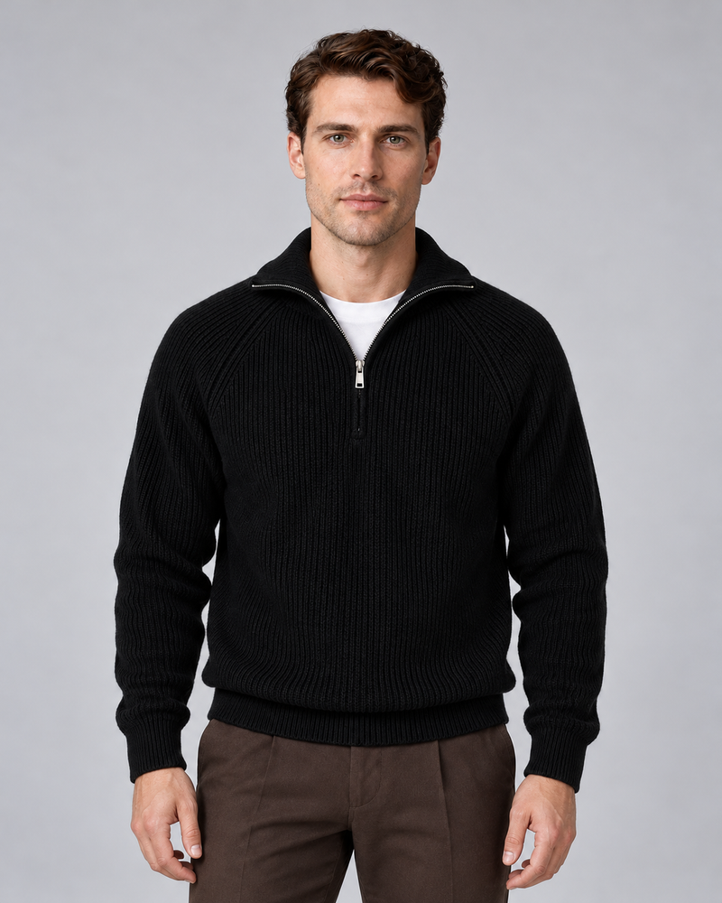 Man wearing black quarter-zip ribbed knitted sweater with stand collar, front view