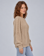 Khaki crew neck cable knit jumper with raglan sleeves, side angle
