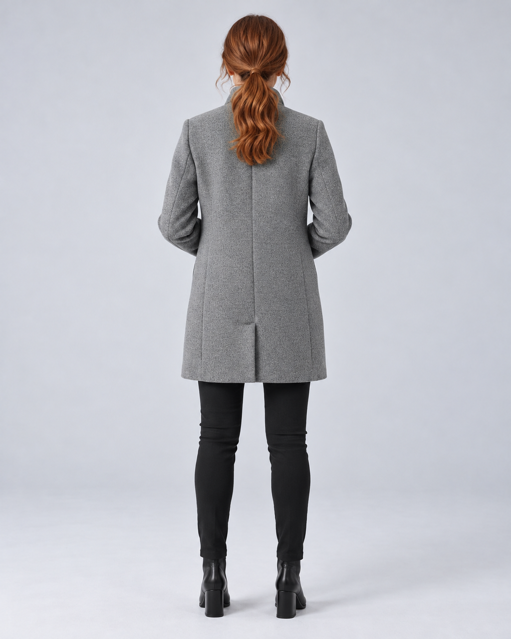SAILSATIN tailored overcoat in Light Grey, back bent arms studio image
