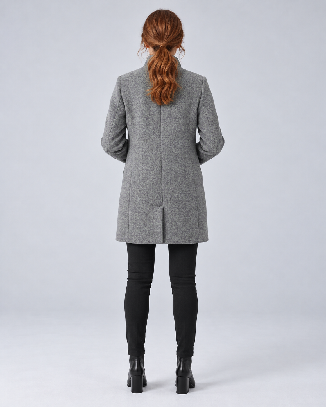 SAILSATIN tailored overcoat in Light Grey, back bent arms studio image