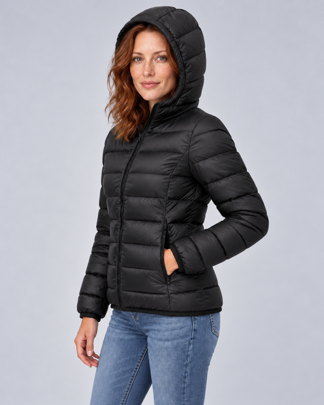 Black lightweight zip puffer, hood up angle view
