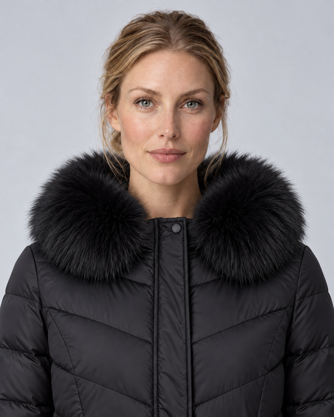 Black longline chevron fur puffer, fur detail view